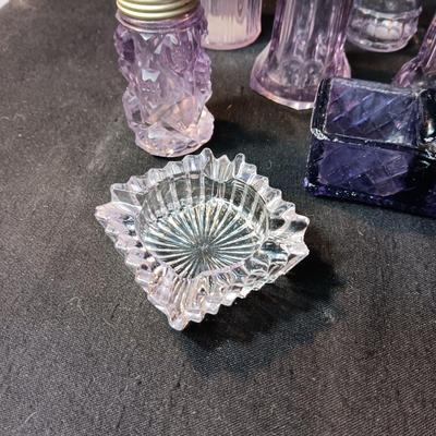 ANTIQUE GLASS PIECES WITH A PURPLE HUE