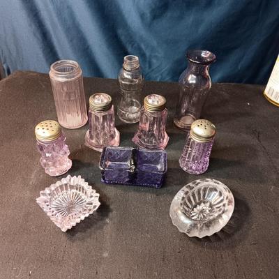 ANTIQUE GLASS PIECES WITH A PURPLE HUE