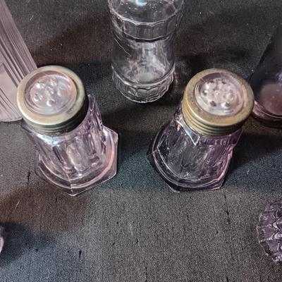 ANTIQUE GLASS PIECES WITH A PURPLE HUE
