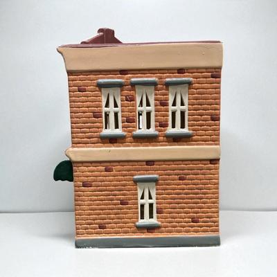 Sale Photo Thumbnail #301: Dept 56 Original Snow Village Bakery 5077-6.  Includes Box, Styrofoam Packer, Light Cord.  Excellent condition, no chips or scratches
Approximately 8.5" H X 6.5" W
