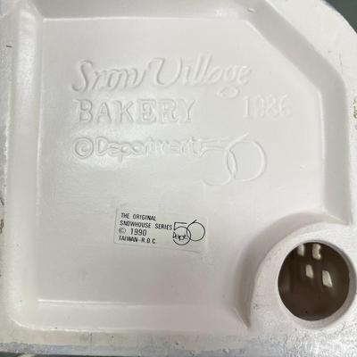 Sale Photo Thumbnail #299: Dept 56 Original Snow Village Bakery 5077-6.  Includes Box, Styrofoam Packer, Light Cord.  Excellent condition, no chips or scratches
Approximately 8.5" H X 6.5" W
