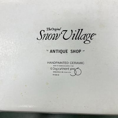 Sale Photo Thumbnail #335: Dept 56 Original Snow Village Antique Shop 51233.  Includes Light cord, box, and styrofoam packer.  Retired in 1989