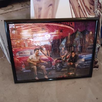6 FOOT CARDBOARD FREE STANDING ELVIS PRESLEY AND A FRAMED ELVIS JIGSAW PUZZLE