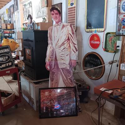 6 FOOT CARDBOARD FREE STANDING ELVIS PRESLEY AND A FRAMED ELVIS JIGSAW PUZZLE