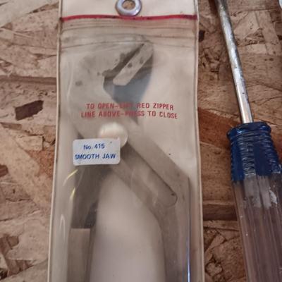 AN ASSORTMENT OF HAND TOOLS