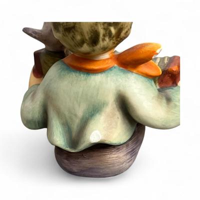 Sale Photo Thumbnail #392: Goebel Hummel Let's Sing Ashtray or Trinket dish #114   Boy Playing an accordion and a bird  Chip on the rear on the coat