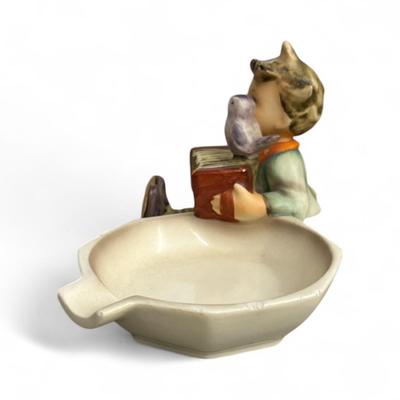 Sale Photo Thumbnail #394: Goebel Hummel Let's Sing Ashtray or Trinket dish #114   Boy Playing an accordion and a bird  Chip on the rear on the coat