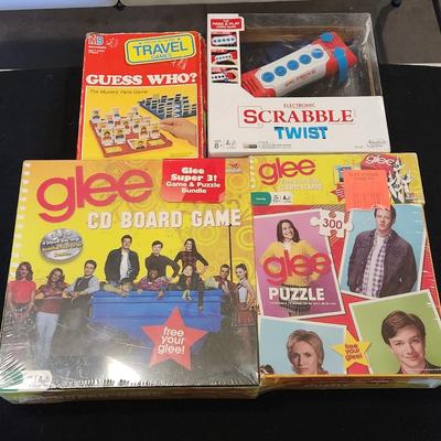 Sale Photo Thumbnail #180: Glee CD board game and Scrabble Twist lot.

Includes all items pictured as is.
All in great condition with Glee and Scrabble being brand new.