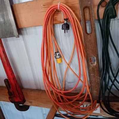 2 EXTENSION CORDS AND A LEVEL