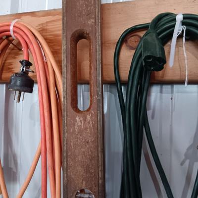 2 EXTENSION CORDS AND A LEVEL