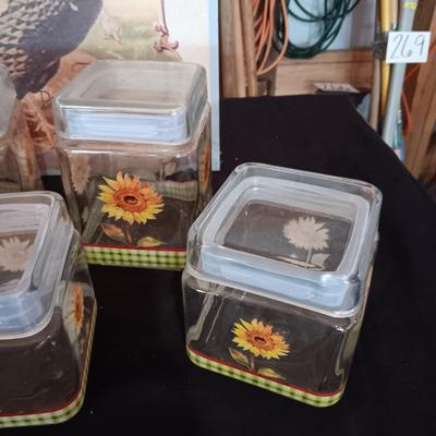GLASS SUNFLOWER CANISTERS, SHAKERS AND A PICTURE