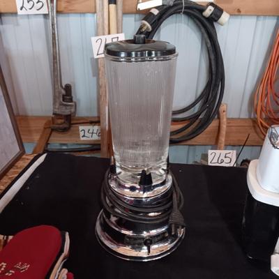 WARING BLENDER, CRANK ICE CRUSHER, LINEENS AND A PITCHER