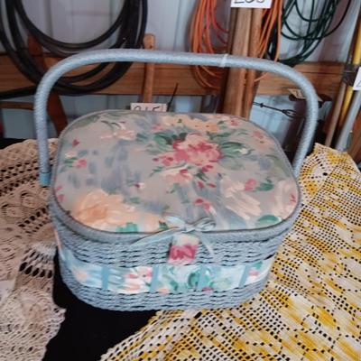 SEWING BASKET W/NOTIONS AND SEVERAL DOILIES