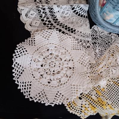 SEWING BASKET W/NOTIONS AND SEVERAL DOILIES