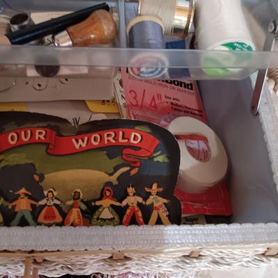 SEWING BASKET W/NOTIONS AND A VARIETY OF DOILIES