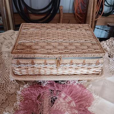 SEWING BASKET W/NOTIONS AND A VARIETY OF DOILIES