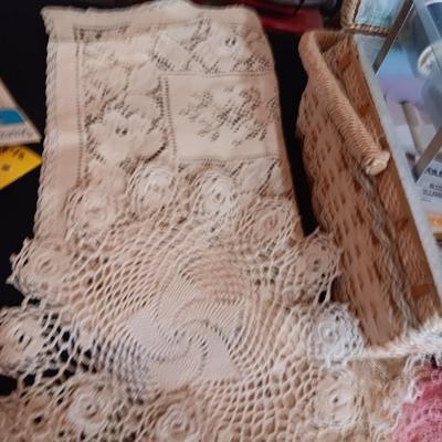 SEWING BASKET W/NOTIONS AND A VARIETY OF DOILIES