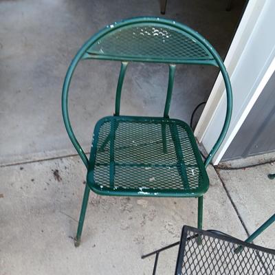 2 FOLDING METAL MESH CHAIRS AND A METAL TABLE