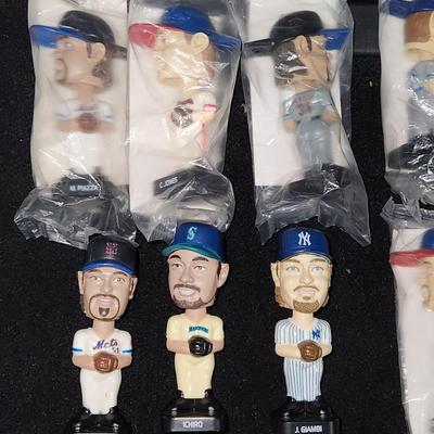 Sale Photo Thumbnail #215: Vintage Post MLB mini Bobble heads Piazza Giambi & more

Will receive all items pictured and are in great condition.