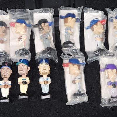 Sale Photo Thumbnail #214: Vintage Post MLB mini Bobble heads Piazza Giambi & more

Will receive all items pictured and are in great condition.
