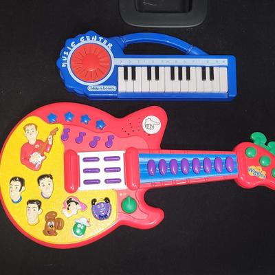 Sale Photo Thumbnail #228: The Wiggles Musical Guitar & Electric KeyboardSpin Master Songs & Guitar Sounds

Will receive all items pictured and are in great condition.