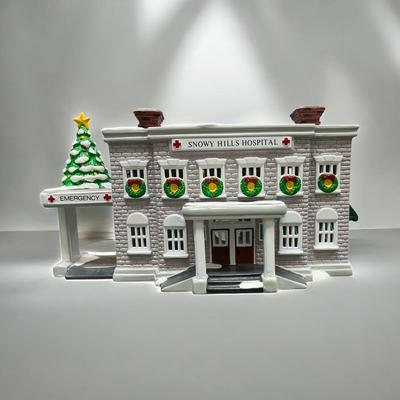 Sale Photo Thumbnail #486: Dept 56 Snow Village Snowy Hills Hospital  #54488-8.  Includes Box, Styrofoam packer, and light cord.  No Chips  Retired in 1996