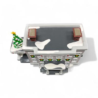 Sale Photo Thumbnail #482: Dept 56 Snow Village Snowy Hills Hospital  #54488-8.  Includes Box, Styrofoam packer, and light cord.  No Chips  Retired in 1996