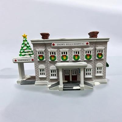 Sale Photo Thumbnail #487: Dept 56 Snow Village Snowy Hills Hospital  #54488-8.  Includes Box, Styrofoam packer, and light cord.  No Chips  Retired in 1996