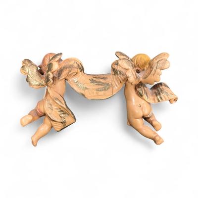 Sale Photo Thumbnail #488: Fontanini Cherubs with Banner Figurine.  Designed and manufactured in Tuscany, Italy, known for high quality religious articles.  Vintage Fontanini piece likely 1986 #610 ornament  Approximately 6" wide X 4" Tall