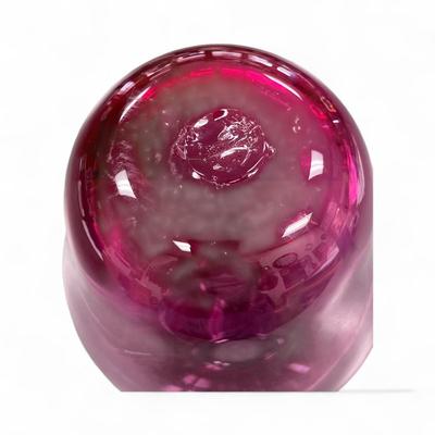 Sale Photo Thumbnail #492: Vintage Cranberry Hand Blown Glass Vase.  It appear to be an MCM Or Art Deco Inspired Design.
6.5" at the widest point.   4" at the base  Note small marks on the top.