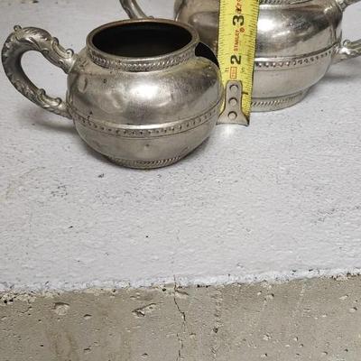 Sale Photo Thumbnail #318: Lot of silverplated and pewterware.