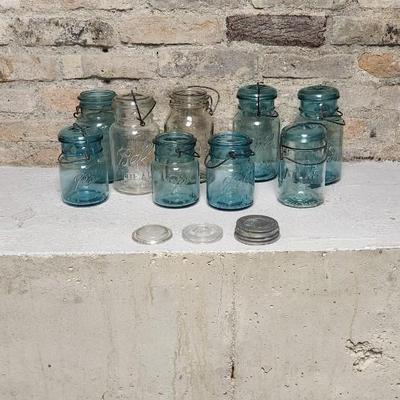 Sale Photo Thumbnail #343: Neat group of old canning jars.