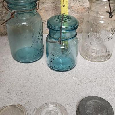Sale Photo Thumbnail #347: Neat group of old canning jars.
