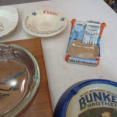 A COLLECTION OF ASHTRAYS