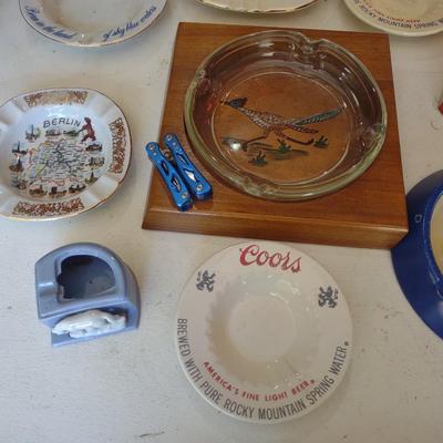A COLLECTION OF ASHTRAYS