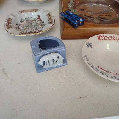 A COLLECTION OF ASHTRAYS