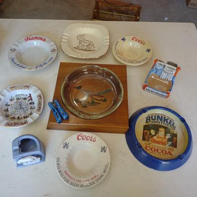 A COLLECTION OF ASHTRAYS