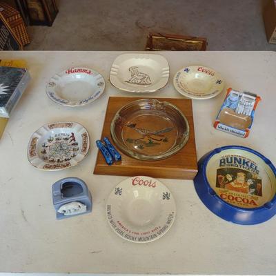 A COLLECTION OF ASHTRAYS