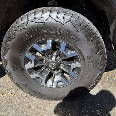 Sale Photo Thumbnail #18: 2023 Toyota Tacoma TRD Off-Road – Rugged, reliable, and adventure-ready! This eye-catching red Tacoma comes with off-road wheels, all-terrain tires, and Toyota’s proven TRD Off-Road package. It has some light cosmetic wear (clear coat on mirrors and a