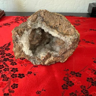 Sale Photo Thumbnail #26: Natural stone geode with sparkling crystal interior.