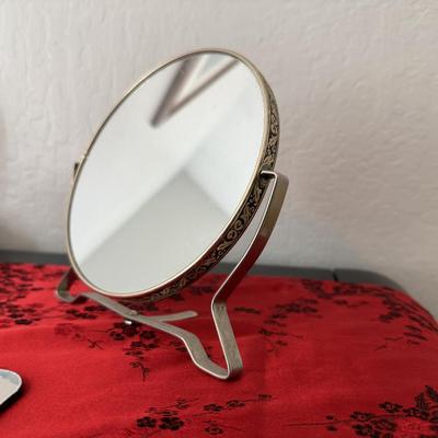 Sale Photo Thumbnail #27: Double-sided tabletop mirror with ornate gold-tone trim.