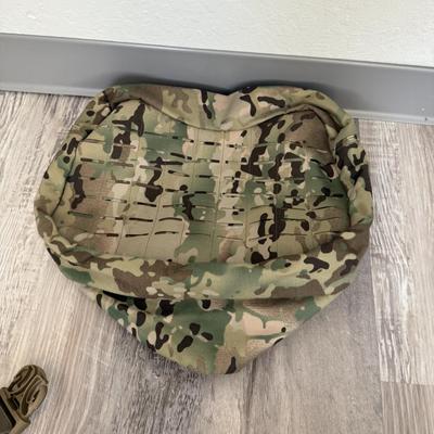 Sale Photo Thumbnail #36: Heavy-duty AKmax Outdoor rucksack system in multicam pattern with multiple attachments. Includes large framed rucksack, hydration carrier, detachable utility pouch, padded hip belt, and additional modular pieces. Built for rugged use, camping, hiking, or 