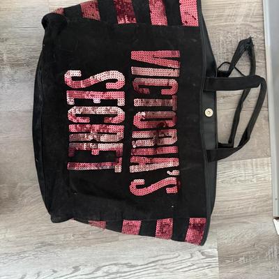 Sale Photo Thumbnail #44: Black and pink striped tote with sequined logo, stylish and perfect for casual use.