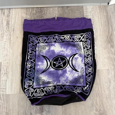 Sale Photo Thumbnail #46: Drawstring-style bag with a purple moon phase and pentagram design, great for festivals or casual use.