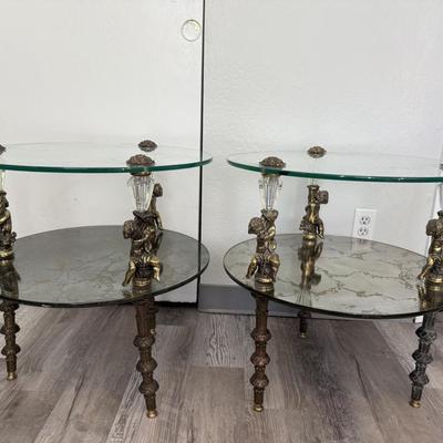 Sale Photo Thumbnail #67: Set of two matching round glass-top side tables featuring ornate gold-tone cherub supports and decorative legs. Mid-century Hollywood Regency style.