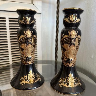 Sale Photo Thumbnail #78: Sophisticated pair of black ceramic vases with intricate gold detailing, featuring classical motifs. Perfect mantel or shelf décor.