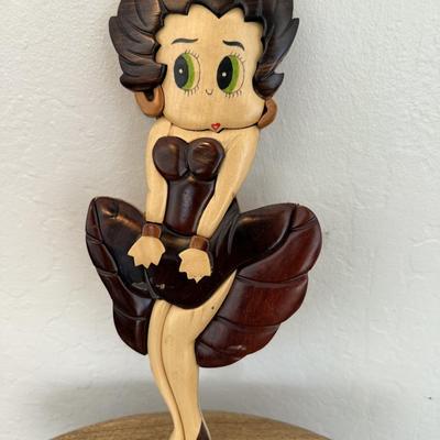 Sale Photo Thumbnail #83: Whimsical hand-carved and painted wooden Betty Boop figure in classic flirty pose. Retro pop-culture wall décor.