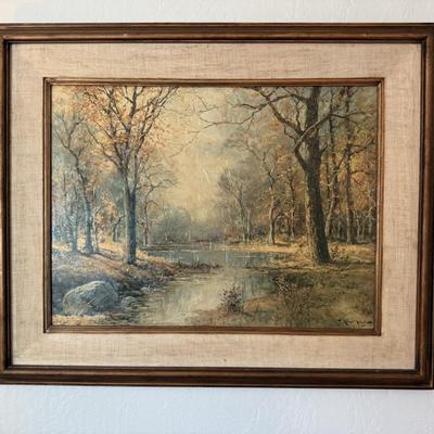 Sale Photo Thumbnail #97: Serene oil painting depicting a peaceful autumn woodland with stream and trees. Signed by artist. Framed in linen and wood.