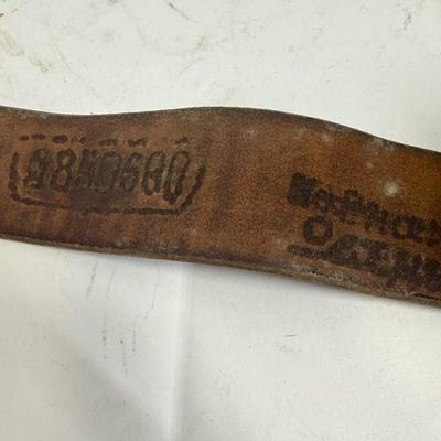 Sale Photo Thumbnail #33: Age unknown. Buckle has some green corrosion.  Belt was stored in a rolled-up manner, but is intact with no splits or fraying.