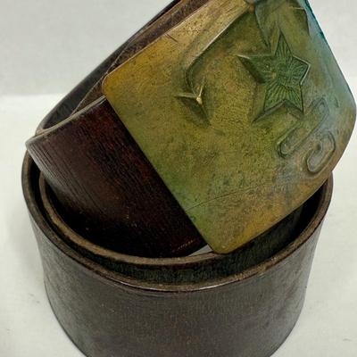Sale Photo Thumbnail #40: Age unknown. Buckle has some green corrosion.  Belt was stored in a rolled-up manner, but is intact with no splits or fraying.